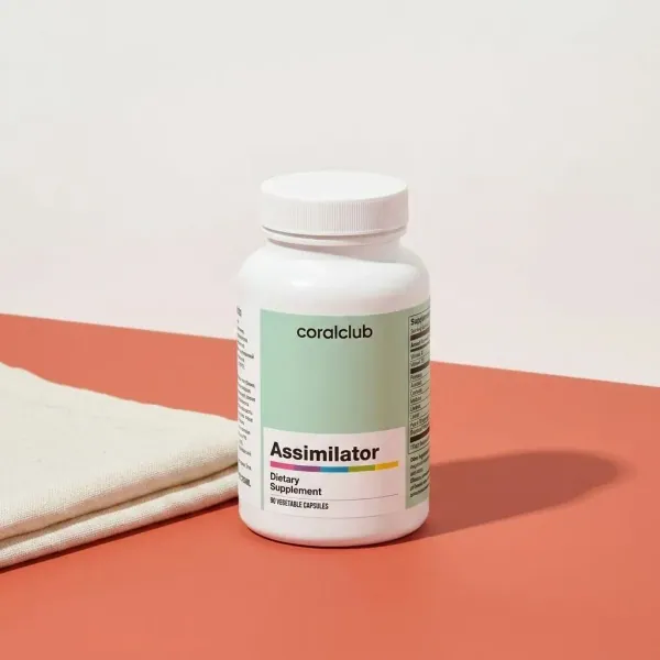 Assimilator dietary supplement packshot with white bottle on a coral background.