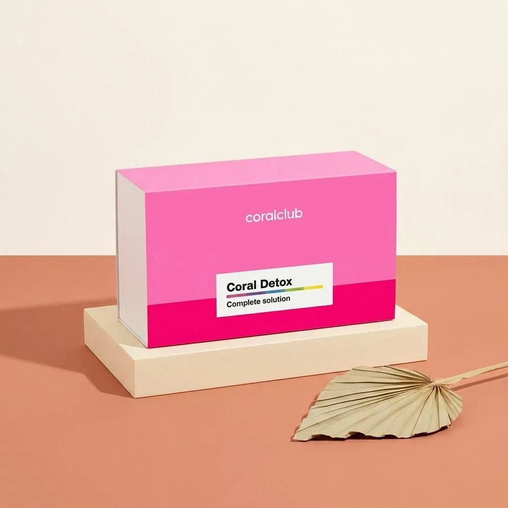 Coral Detox packshot with bold pink packaging on a neutral background.