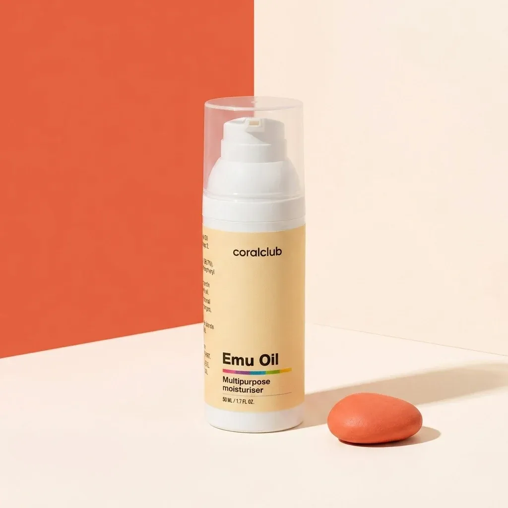 Emu Oil packshot with pump dispenser and orange accent stone.