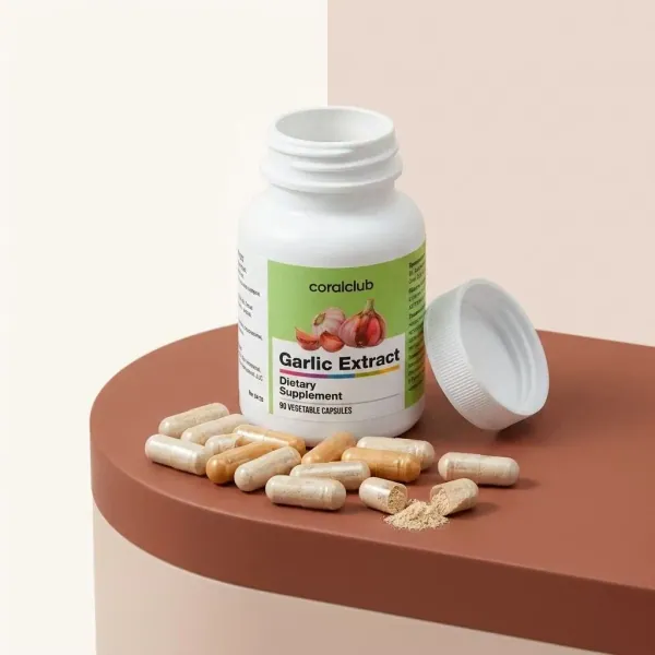 Garlic Extract dietary supplement bottle with vegetable capsules and garlic powder detail.