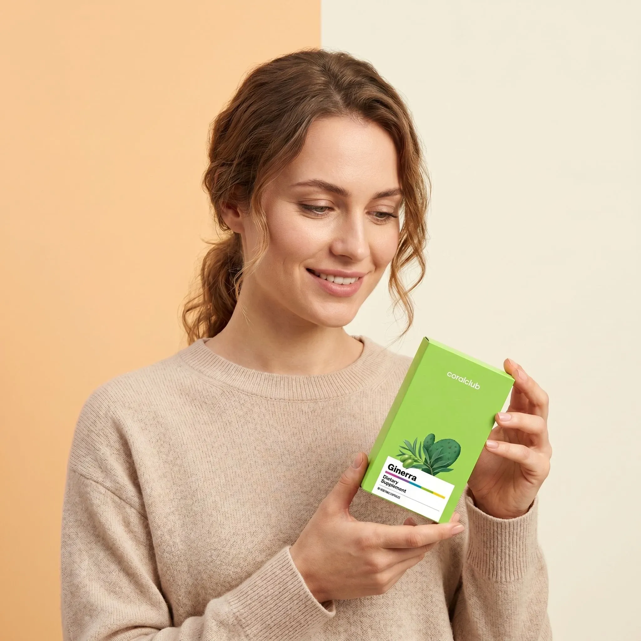 Ginerra lifestyle image featuring a woman holding a green box with herbal ingredients.