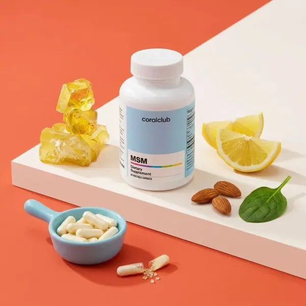 MSM dietary supplement bottle with capsules, lemon slices, almonds, and spinach on a colorful background.