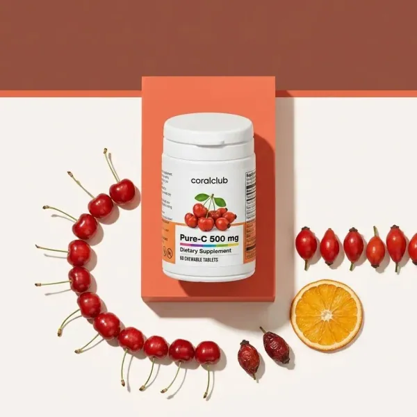 Pure-C 500 mg dietary supplement bottle with rose hips and orange slices on a minimalistic background.