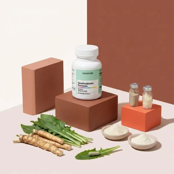 Quattrobiotic Formula bottle with herbal ingredients and powders on colorful blocks.