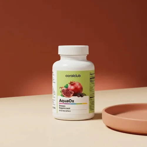 AquaOx dietary supplement bottle with pomegranate and blackcurrant on a neutral background.