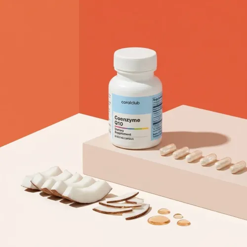 Coenzyme Q10 dietary supplement bottle with softgel capsules and coconut slices on a pastel background.