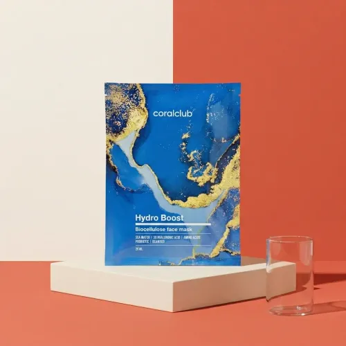 Hydro Boost Biocellulose Facial Mask packshot with vibrant blue and gold design on a minimalist background.
