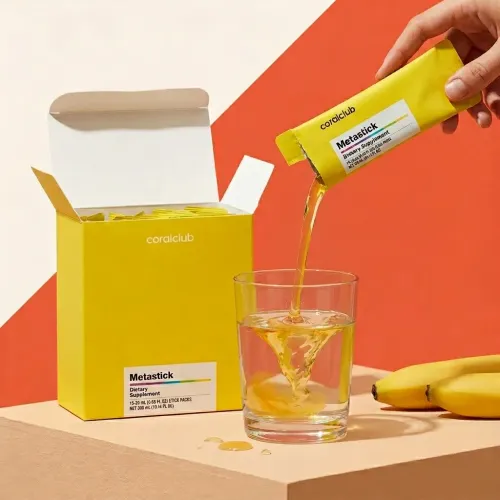 Metastick dietary supplement detail with yellow packaging and liquid being poured into a glass.
